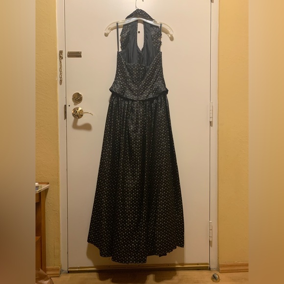 Black gown with gold and purple details. - Picture 7 of 8